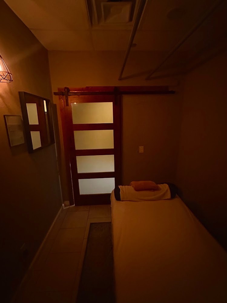 Softly lit private treatment room